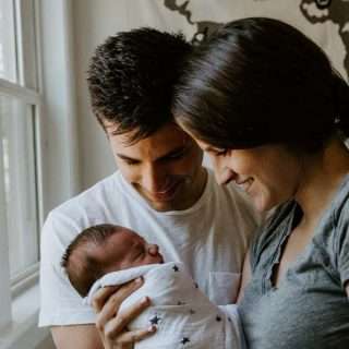 husband caring for family